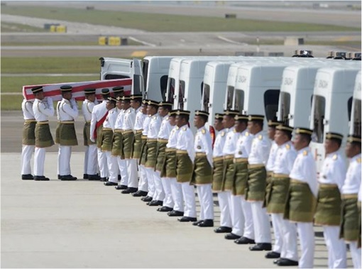 Malaysian Flight MH17 Victims Return Home - Soldiers Carrying Last Coffin to Hearses