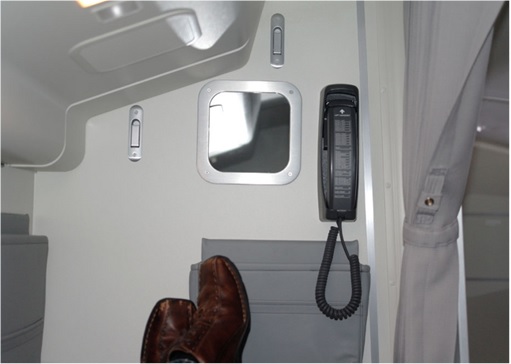 Secret Revealed - Crew Rest Area - Cabin Crew Rest Area on Boeing 787 Dreamliner - curtains, a small mirror and hooks