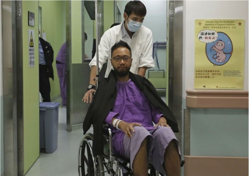 Hong Kong Police Beat Protester Ken Tsang - Ken Tsang Wheel Out of Hospital