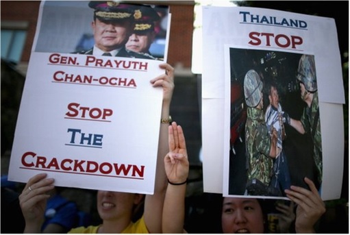 Thai with Three-Finger Salute at PM Prayuth Chan-Ocha