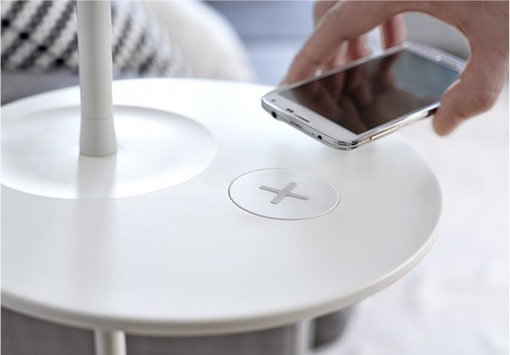 IKEA Wireless Charging Furniture - Putting Smartphone on Plus sign