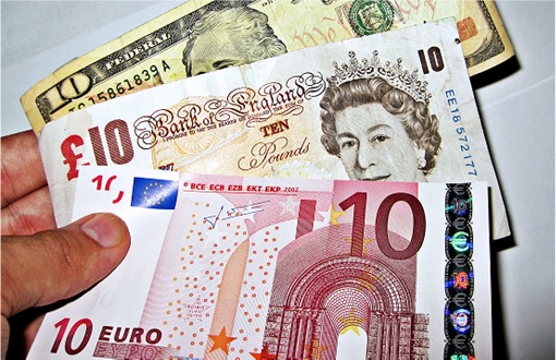 Global Currencies - US Dollar, UK Pound, Euro