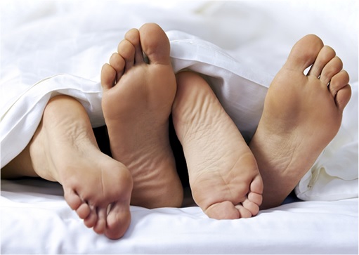 Legs Under Blanket - Lovers having Sex
