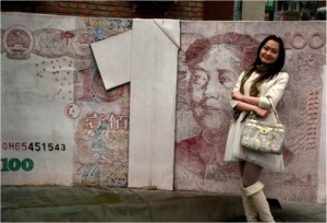 Girl Standing in Front of Giant China Yuan Note