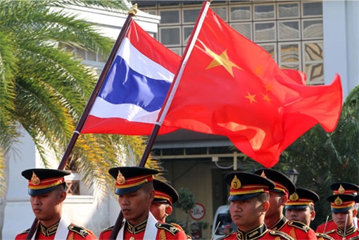 Soldiers Carry China and Thailand Flags