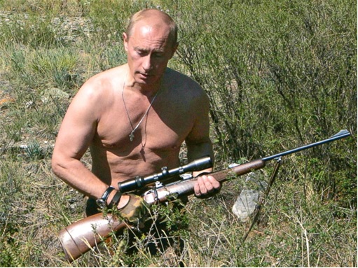 Putin Carries Rifle Hunting Bare Chested