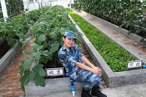 Fiery Cross Reef in South China Sea - Female Military Posing