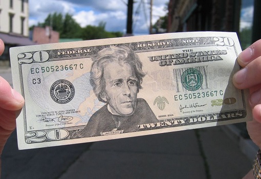 Holding Twenty Dollar $20 Currency Note Bill