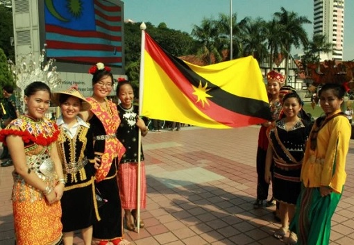 People of Sarawak with Flag