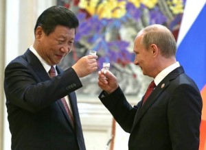 Russian President Vladimir Putin toasting Chinese President Xi Jinping