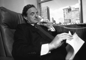 George Soros Making A Call at Trading Desk