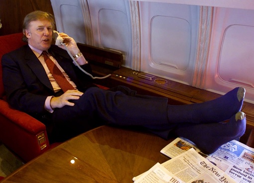 president-donald-trump-on-the-phone-aboard-plane