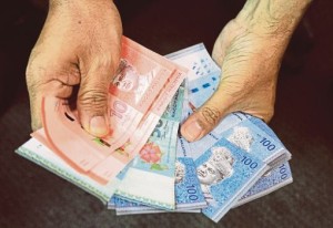 malaysia-corruption-offering-money