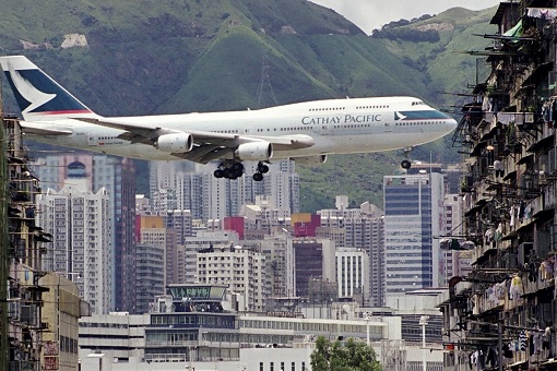 Cathay Pacific Plane Flies Over Kowloon