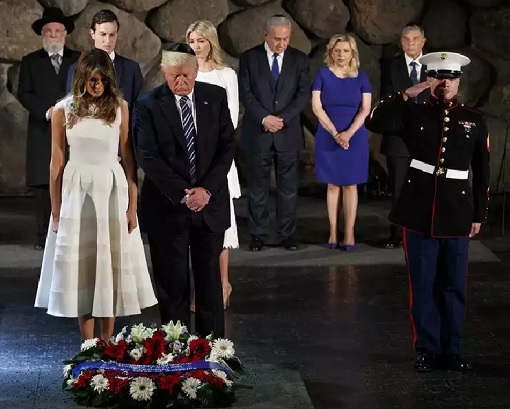 Fashion Diplomacy - Melania Trump First Foreign Trip - Israel - Holocaust Memorial - White and Creme-Striped Sleeveless Dress by designer Roksanda