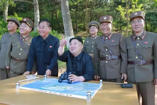 North Korea ICBM Missile Testing - Kim Jong-un and Official Watching