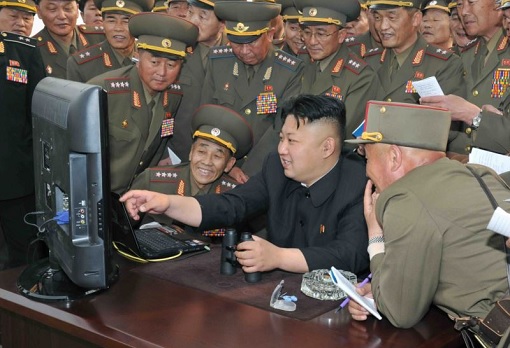 Kim Jong-un Using Computer Watched by Military Personnel