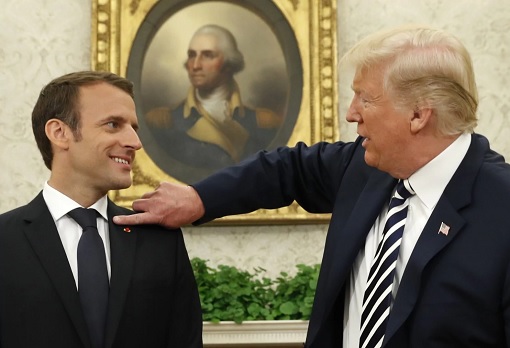 President Donald Trump Wipes Dandruff Off President Emmanuel Macron Shoulder