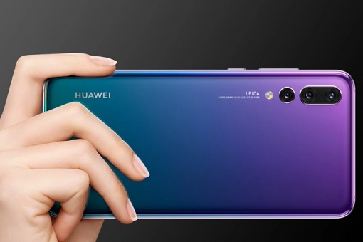 Holding Huawei Smartphone