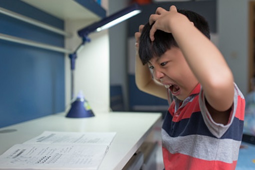 Singapore PSLE Exam - Students Cracking Head