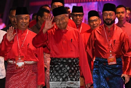 Muhyiddin Yassin and Mahathir Mohamad and Mukhriz Mahathir