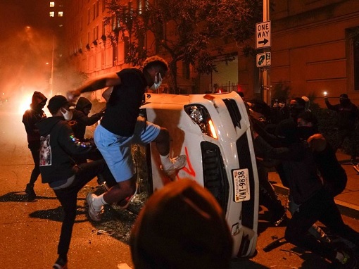 US Race Riots - Car Overturned