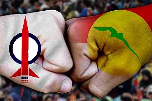 DAP-UMNO Cooperation - Fist Bump