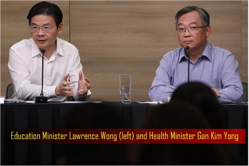 Singapore Education Minister Lawrence Wong and Health Minister Gan Kim Yong