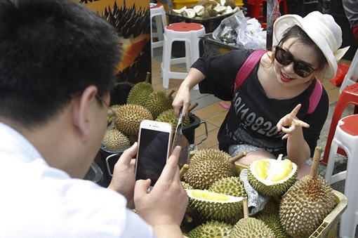 Chinese Tourist Posing With Durian