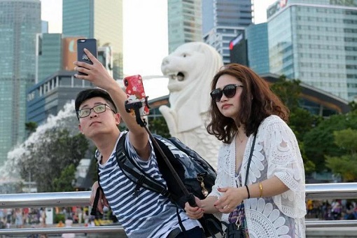 Chinese Tourist Posing in Singapore