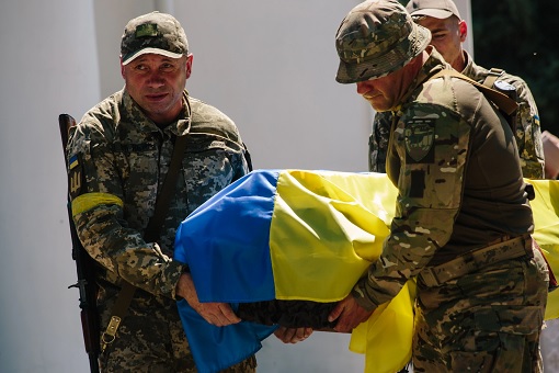 Ukraine War - Flag Wrapping Coffin