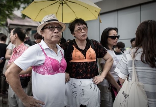 Hong Kong Protester Guilty of Using Breast To Attack Policeman - Men Wearing Bras 2