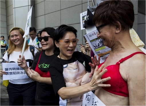 Hong Kong Protester Guilty of Using Breast To Attack Policeman - Men Wearing Bras 4