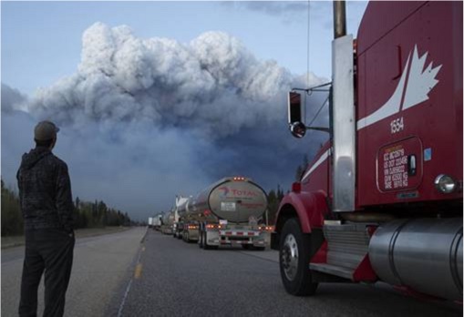Oil Disruption - Wild Fire Threatening Oil Trailer Transporter