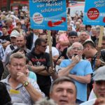 Terribly Upset! - Merkel Heckled With 