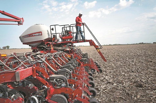 Trade War - American Farmer Uses A Tractor To Plant Soybeans