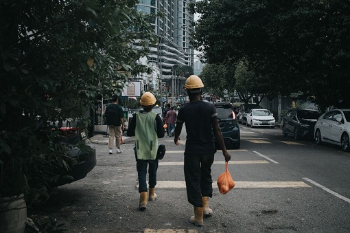 Migrant Worker Corruption - Bangladeshi Workers Leaving Construction Site