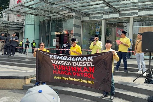 Protesters in Malaysia - Banner Calling for Diesel Subsidies and Cheaper Petrol Prices
